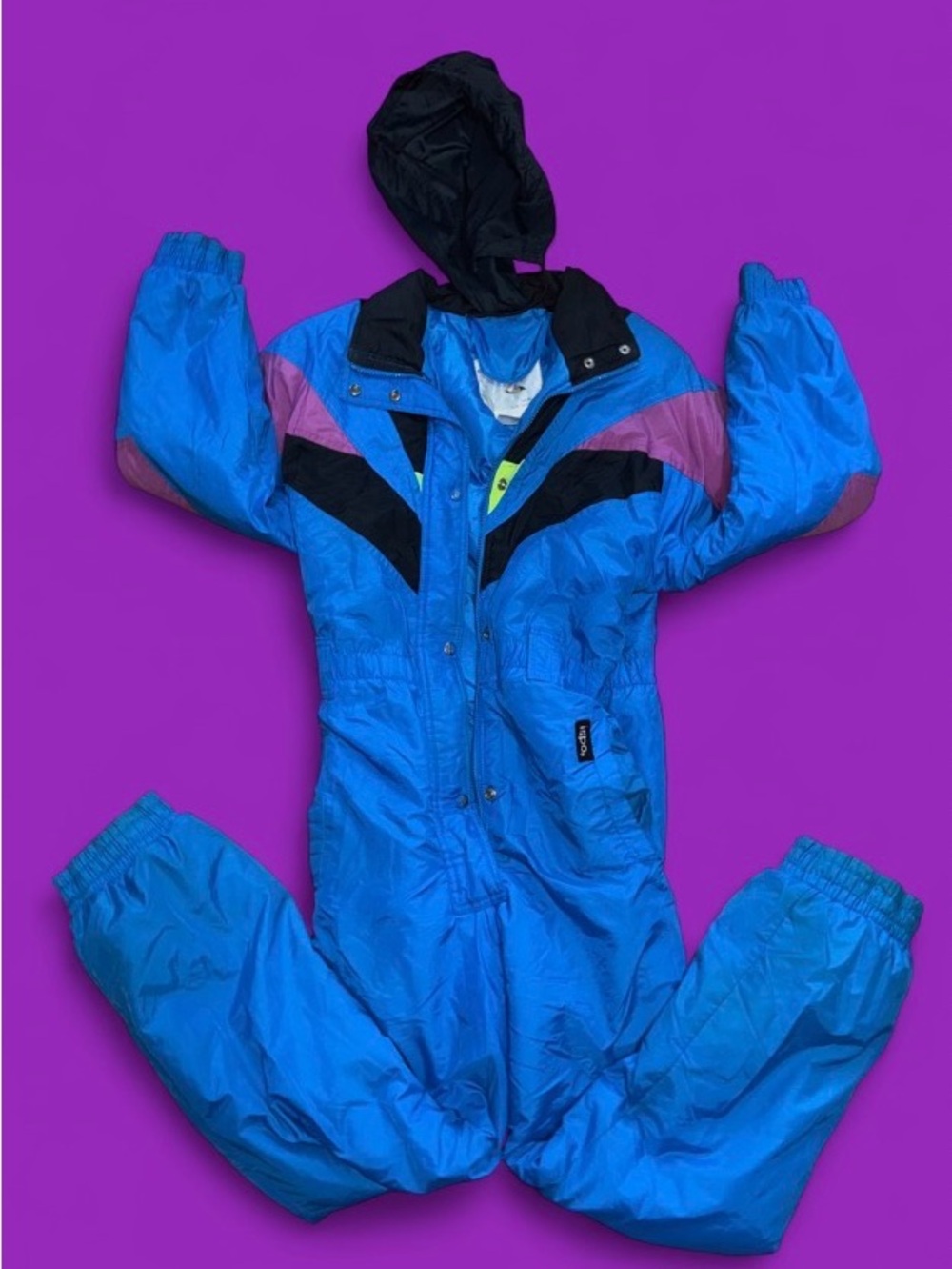 Bright Blue Retro One-Piece Ski Suit with Black & Purple Accents